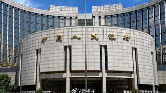 出乎市场意料 中国政府宣布调低两个关键利率